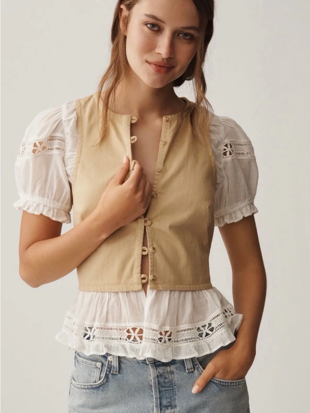 Anthropologie Tan Vest Layered Over White Eyelet Blouse